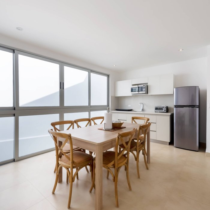 Comedor Apartamento Siete Personas Vacacionando